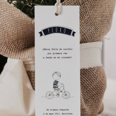 First Communion details for a boy in blue and white