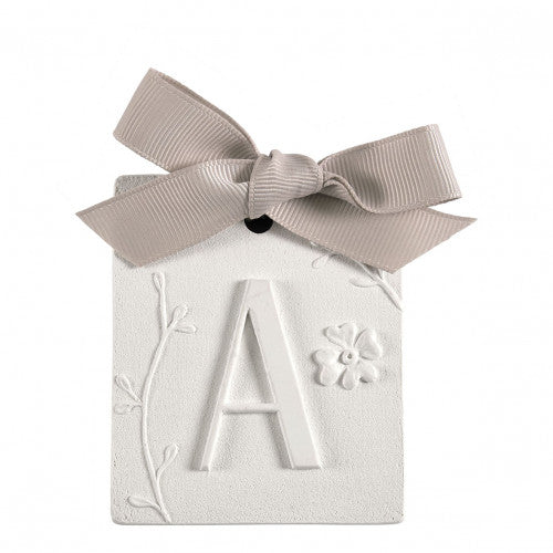 Scented detail Initial with bow