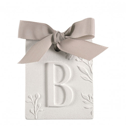 Scented detail Initial with bow