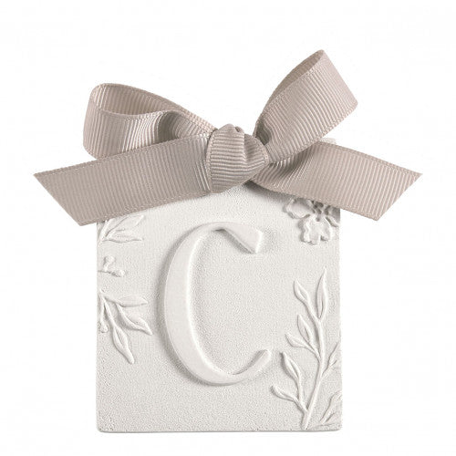 Scented detail Initial with bow