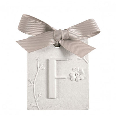 Scented detail Initial with bow