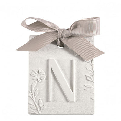 Scented detail Initial with bow