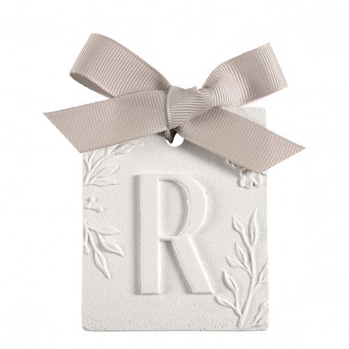 Scented detail Initial with bow