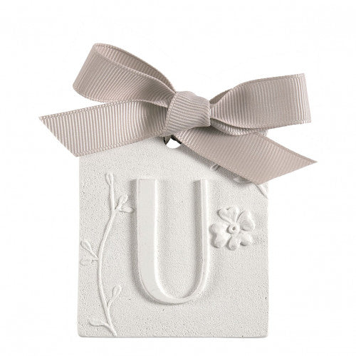 Scented detail Initial with bow