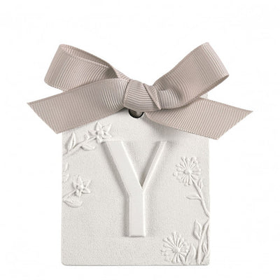 Scented detail Initial with bow