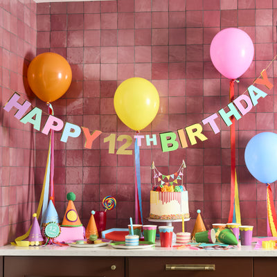 Guirnalda multicolor Happy Birthday con números personalizables