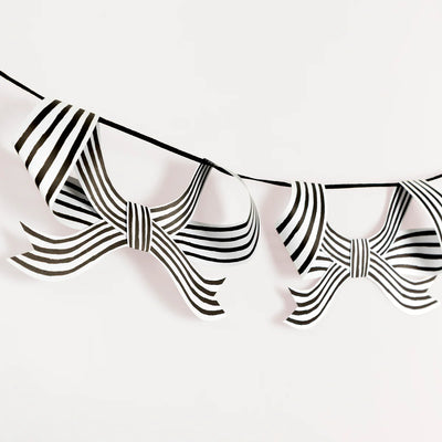 Garlands of black and white ribbons