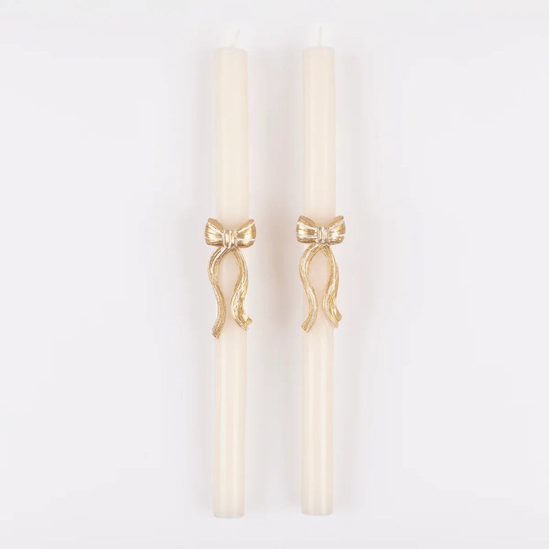Conjunto de velas compridas com laço dourado 3D