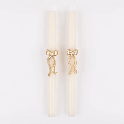 Conjunto de velas compridas com laço dourado 3D