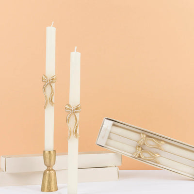 Conjunto de velas compridas com laço dourado 3D