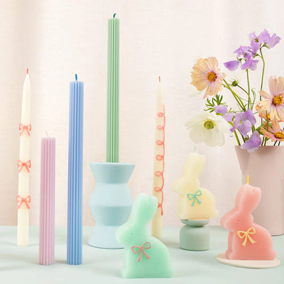 Conjunto de velas longas de fita rosa