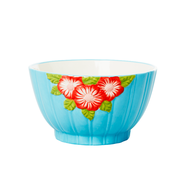 Turquoise ceramic bowl with red flowers