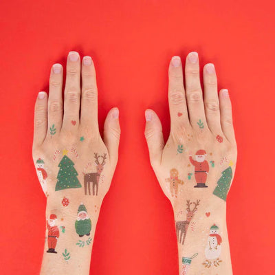 Tatuagem temporária com motivos de Natal