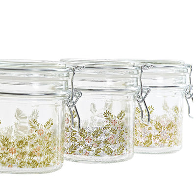 Small glass jar M with wild flowers hermetic closure