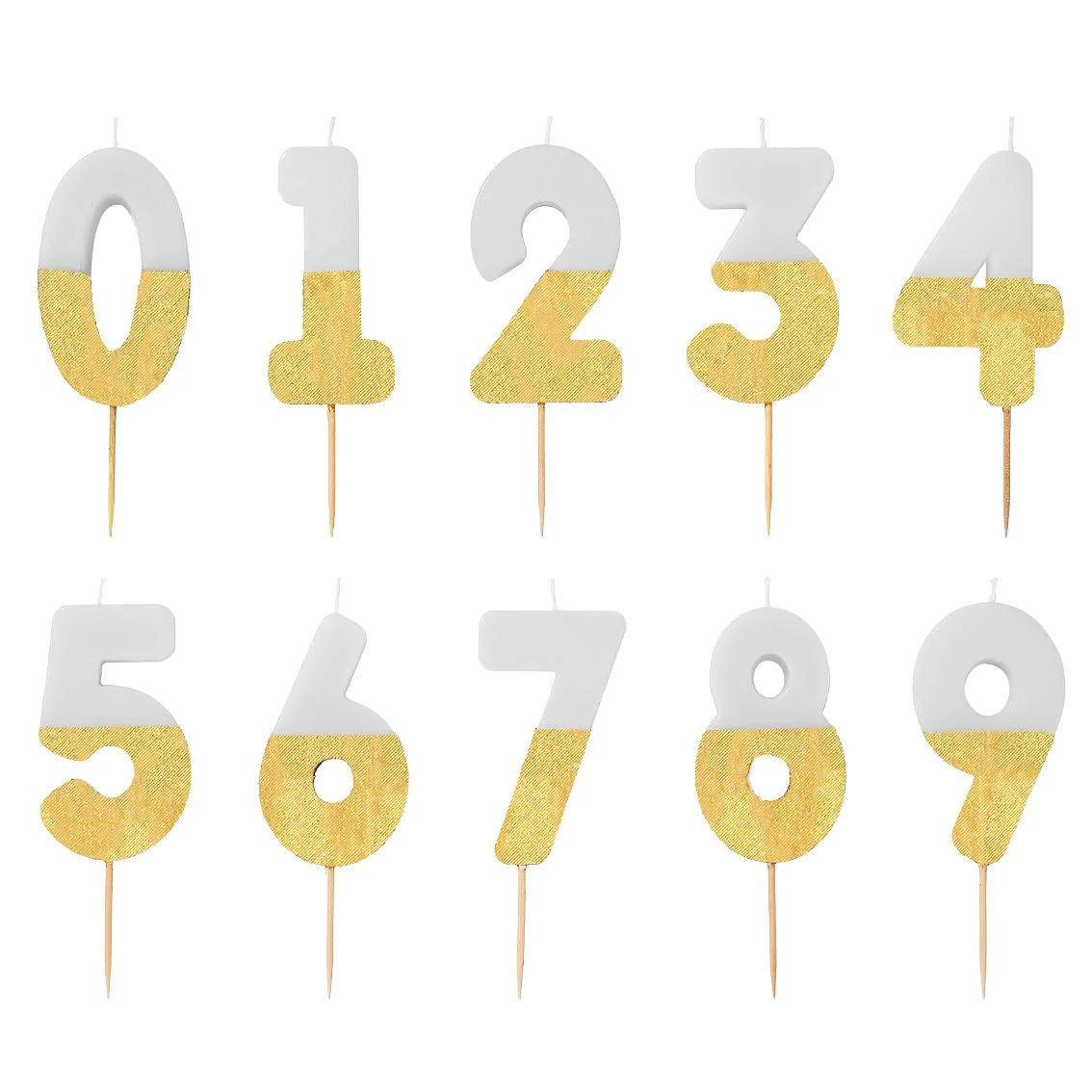 white and gold number candles